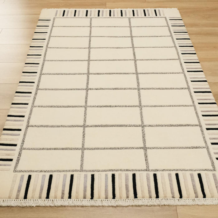 El Dokuma Geometrik Desenli Krem Halı — 95x150 cm