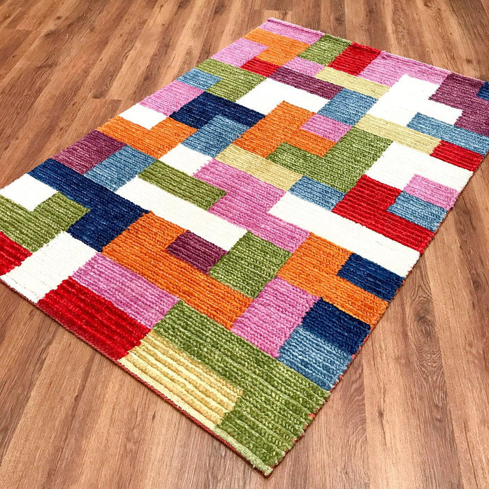 Geometrik Desenli El Dokuma Halı — modern tasarım